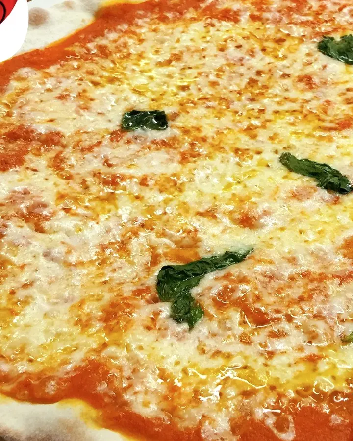 Margherita pizza with basil
